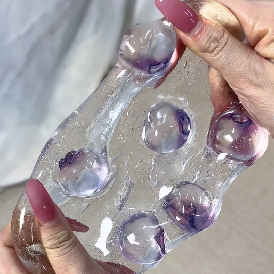 Handmade coconut oil glass fruit squishy ball