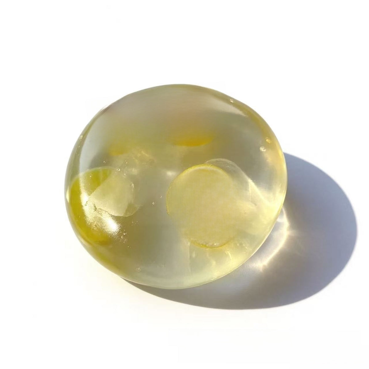 Handmade coconut oil glass fruit squishy ball