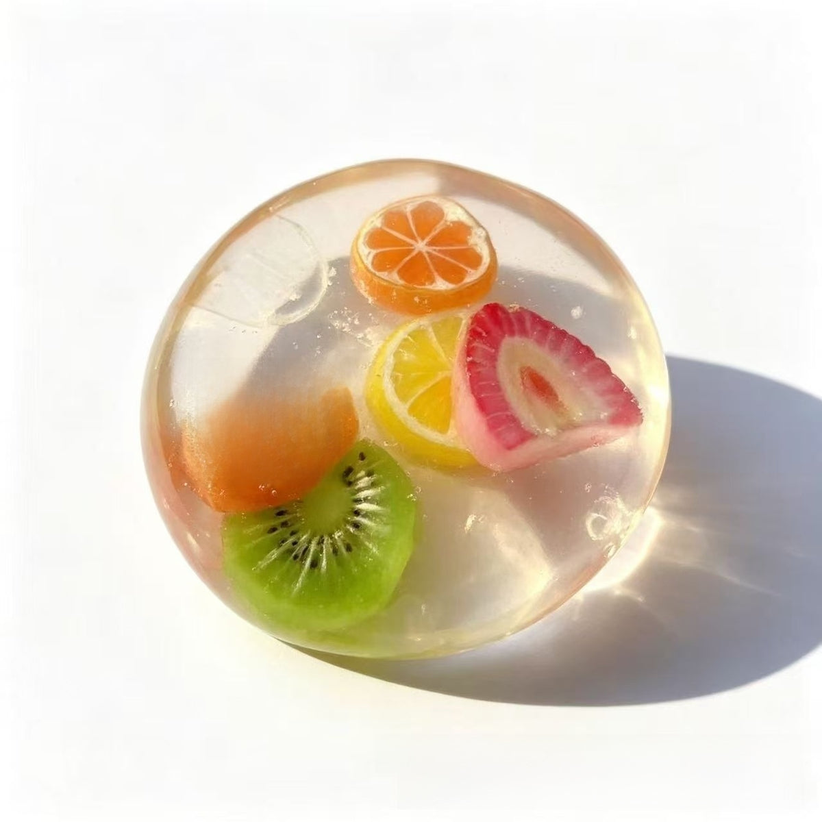Handmade coconut oil glass fruit squishy ball