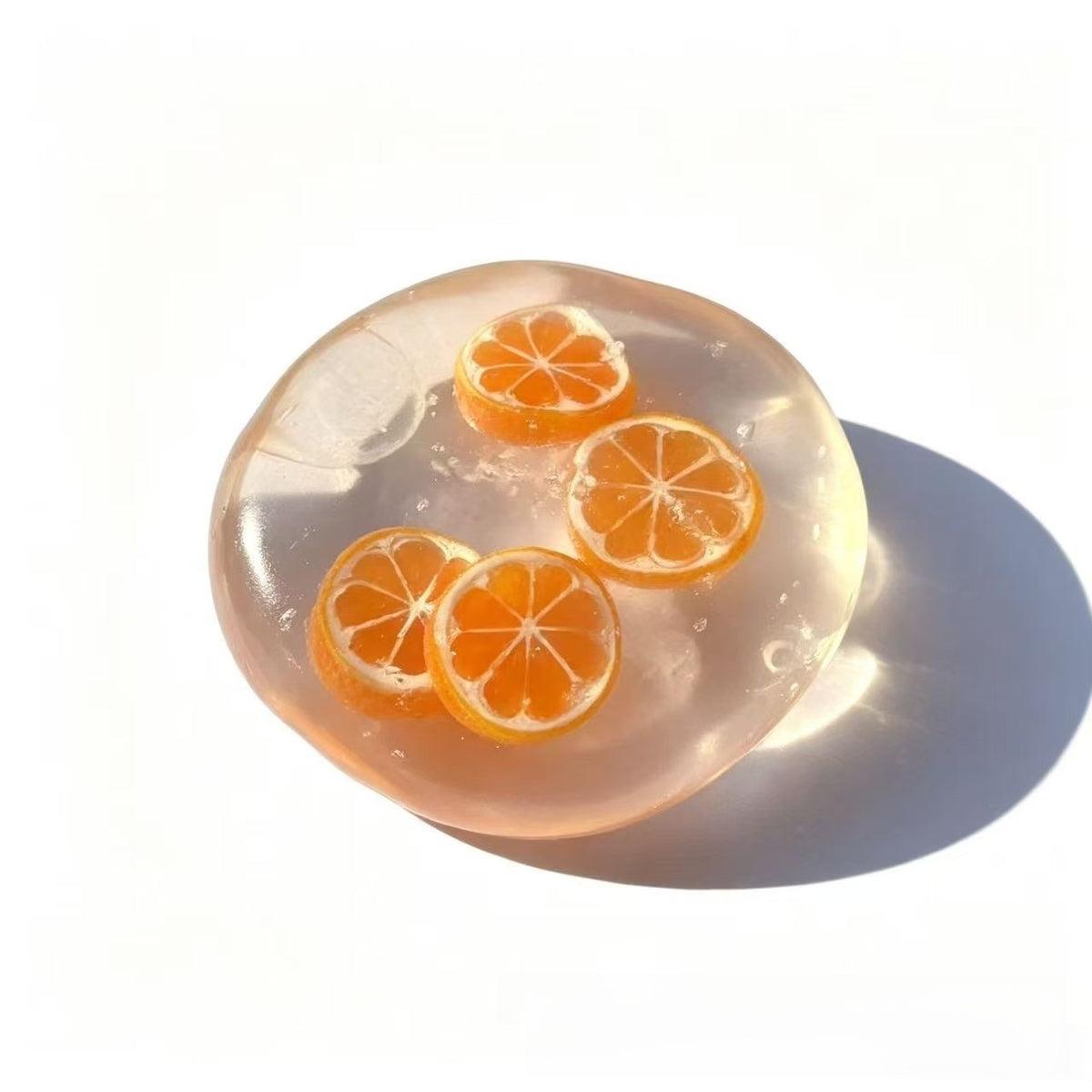 Handmade coconut oil glass fruit squishy ball