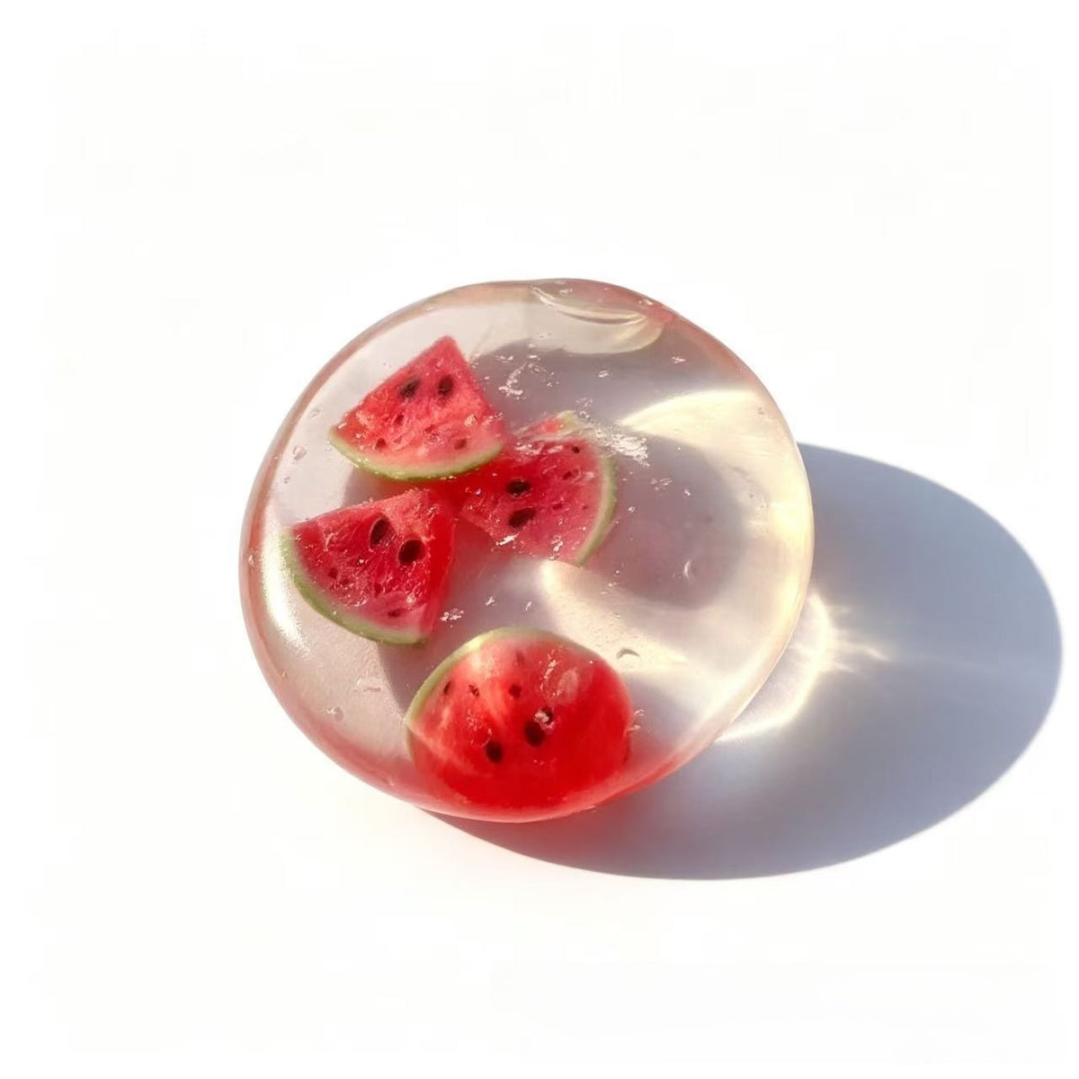 Handmade coconut oil glass fruit squishy ball